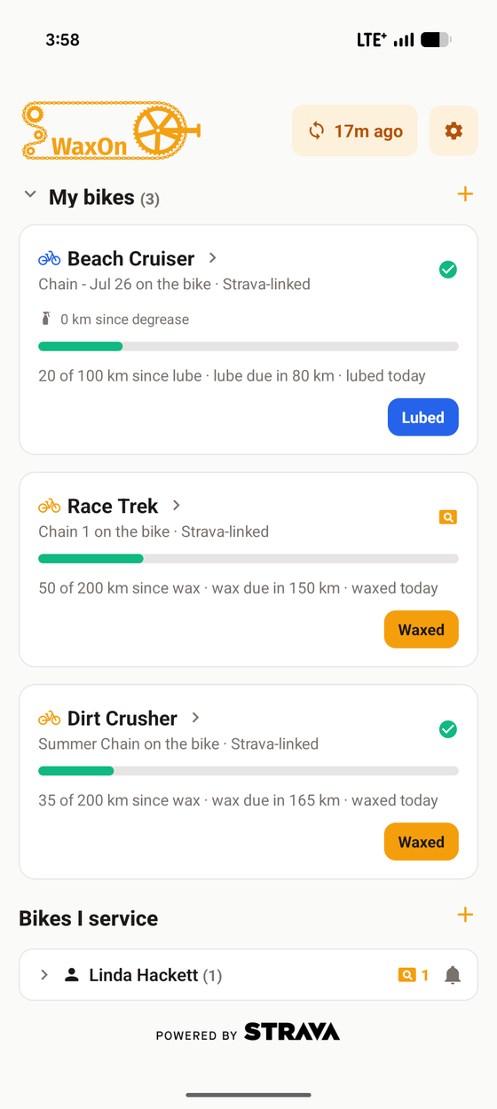 The WaxOn dashboard showing three bikes, each with a progress bar and a Waxed or Lubed button, and a Bikes I service section below.