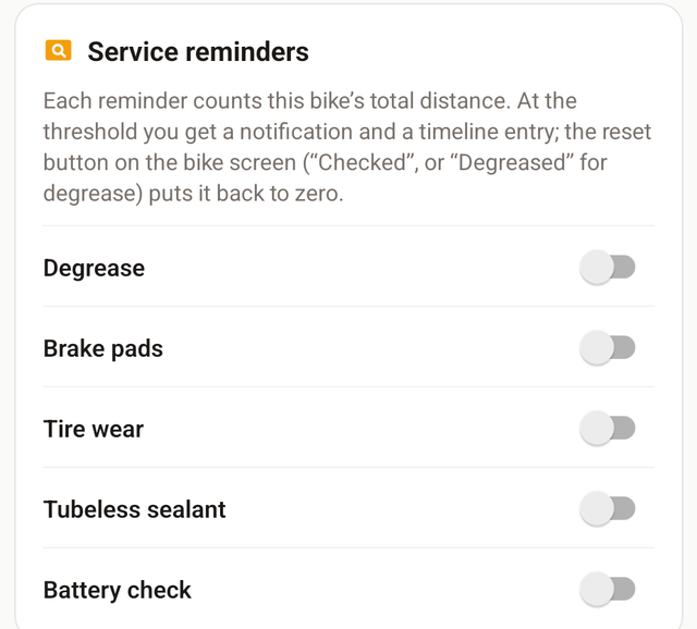 The Service reminders card in bike settings, with switches for Degrease, Brake pads, Tire wear, Tubeless sealant and Battery check.